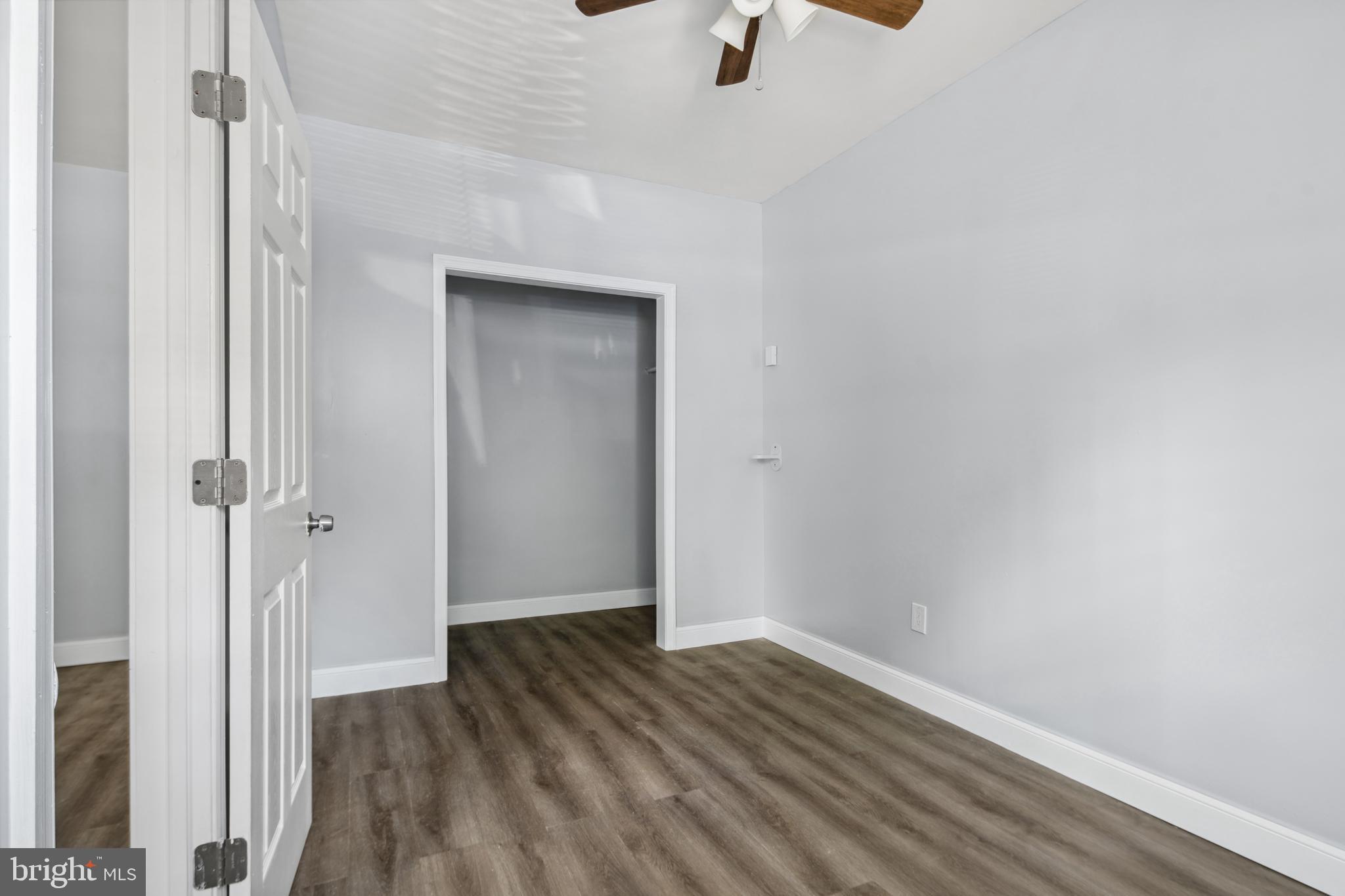 171 East Sharpnack Street Philadelphia, PA 19119 - Photo 3 of 15 a view of a room with wooden floor closet and windows