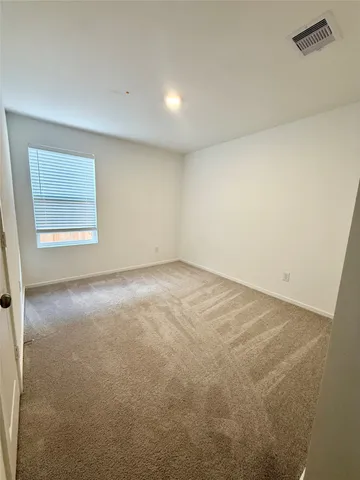 an empty room with a workbench