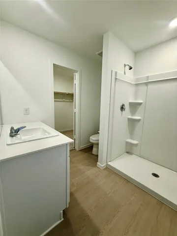 a bathroom with a sink and mirror