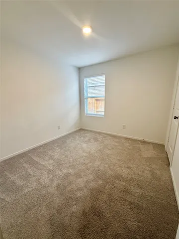 an empty room with a natural light