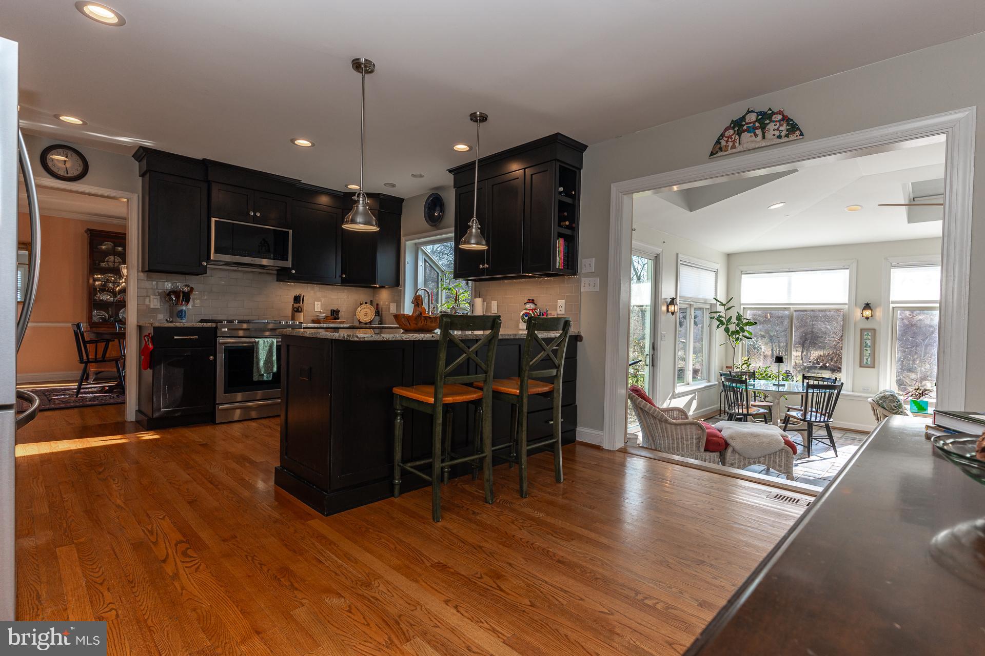 820 Waverly Road Kennett Square, PA 19348 - Photo 16 of 46 a living room with stainless steel appliances lots of furniture and kitchen view