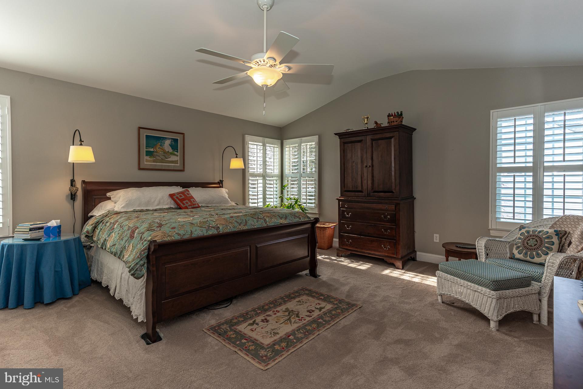 820 Waverly Road Kennett Square, PA 19348 - Photo 23 of 46 a spacious bedroom with a bed and a couch