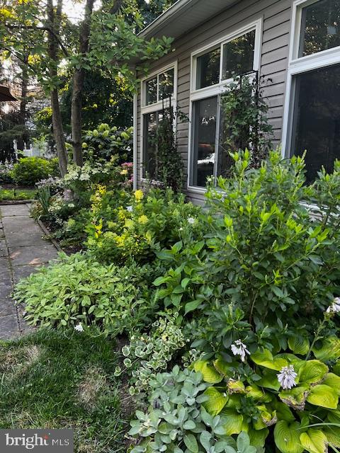 820 Waverly Road Kennett Square, PA 19348 - Photo 44 of 46 a view of a house with potted plants and large tree