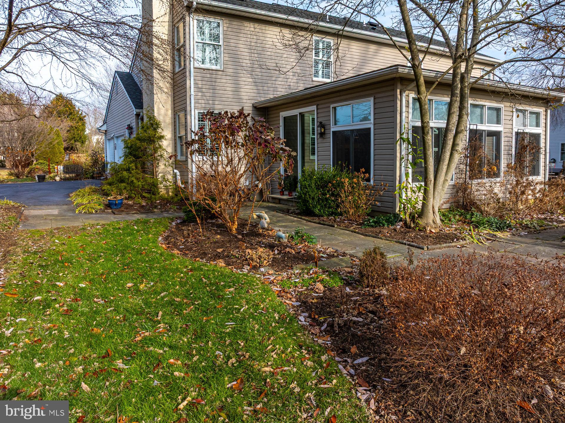 820 Waverly Road Kennett Square, PA 19348 - Photo 6 of 46 a view of a wooden house with a yard and large tree