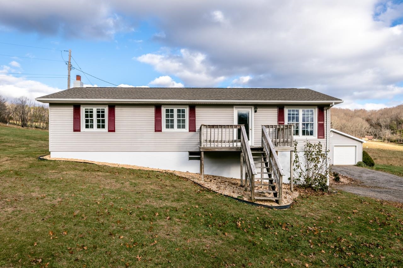 1052 Dutch Hollow Road Raphine, VA 24472 - Photo 1 of 46 a view of a house with a yard