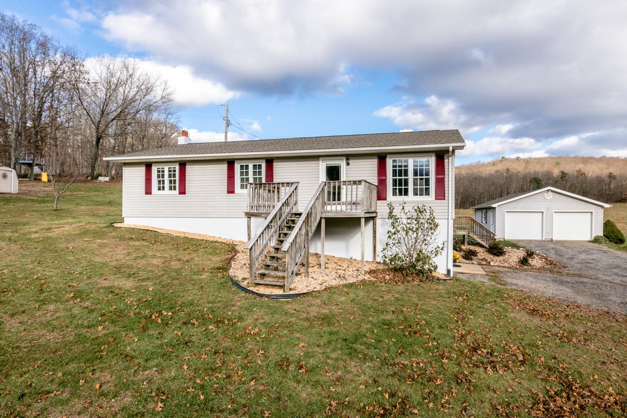 1052 Dutch Hollow Road Raphine, VA 24472 - Photo 28 of 46 a front view of a house with garden