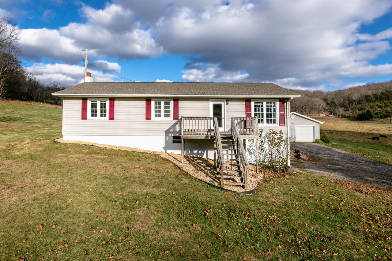 1052 Dutch Hollow Road Raphine, VA 24472 - Photo 30 of 46 a front view of a house with garden