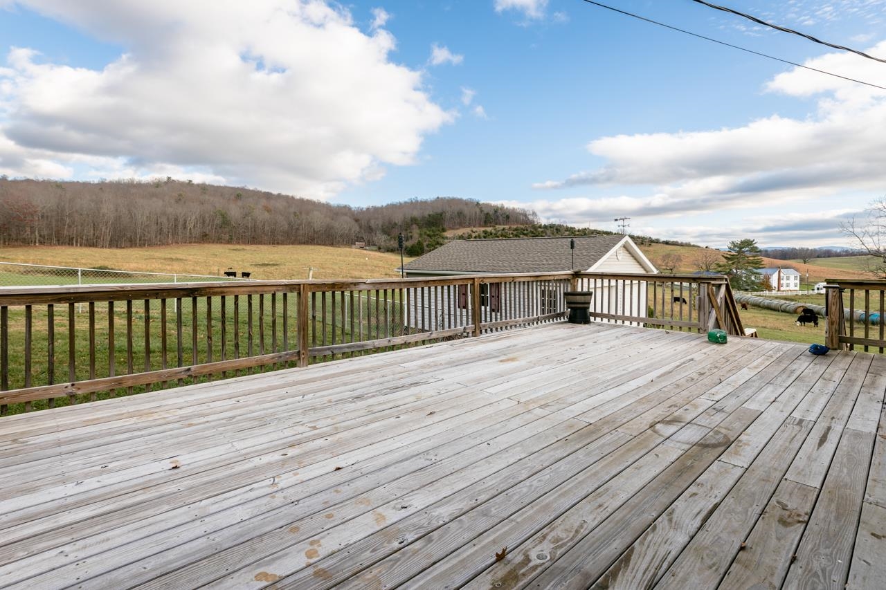 1052 Dutch Hollow Road Raphine, VA 24472 - Photo 40 of 46 a view of house with deck outdoor space and garden