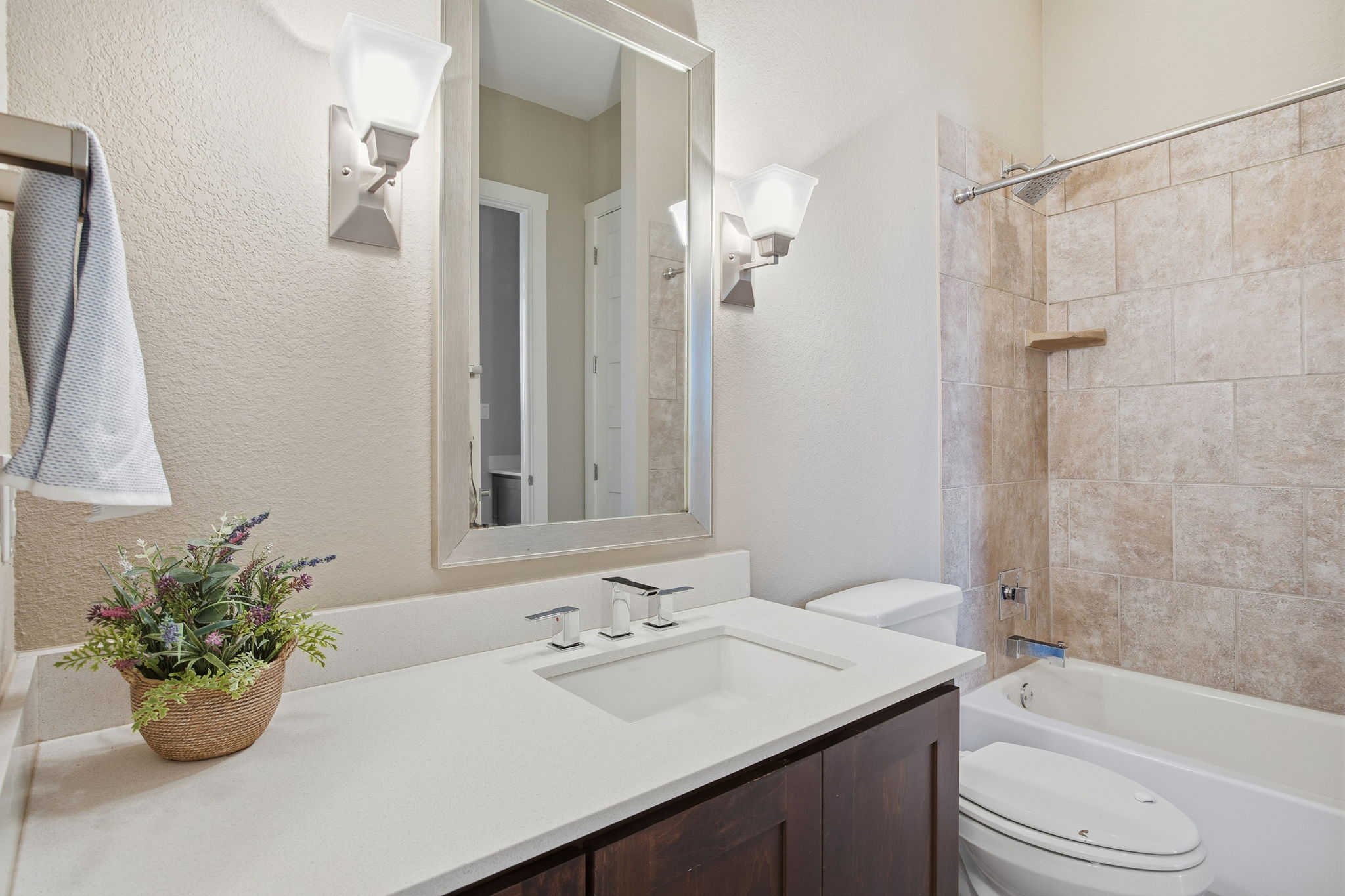 3521 Marcae Court Austin, TX 78704 - Photo 20 of 37 Bathroom featuring shower / washtub combination, vanity, and a textured wall