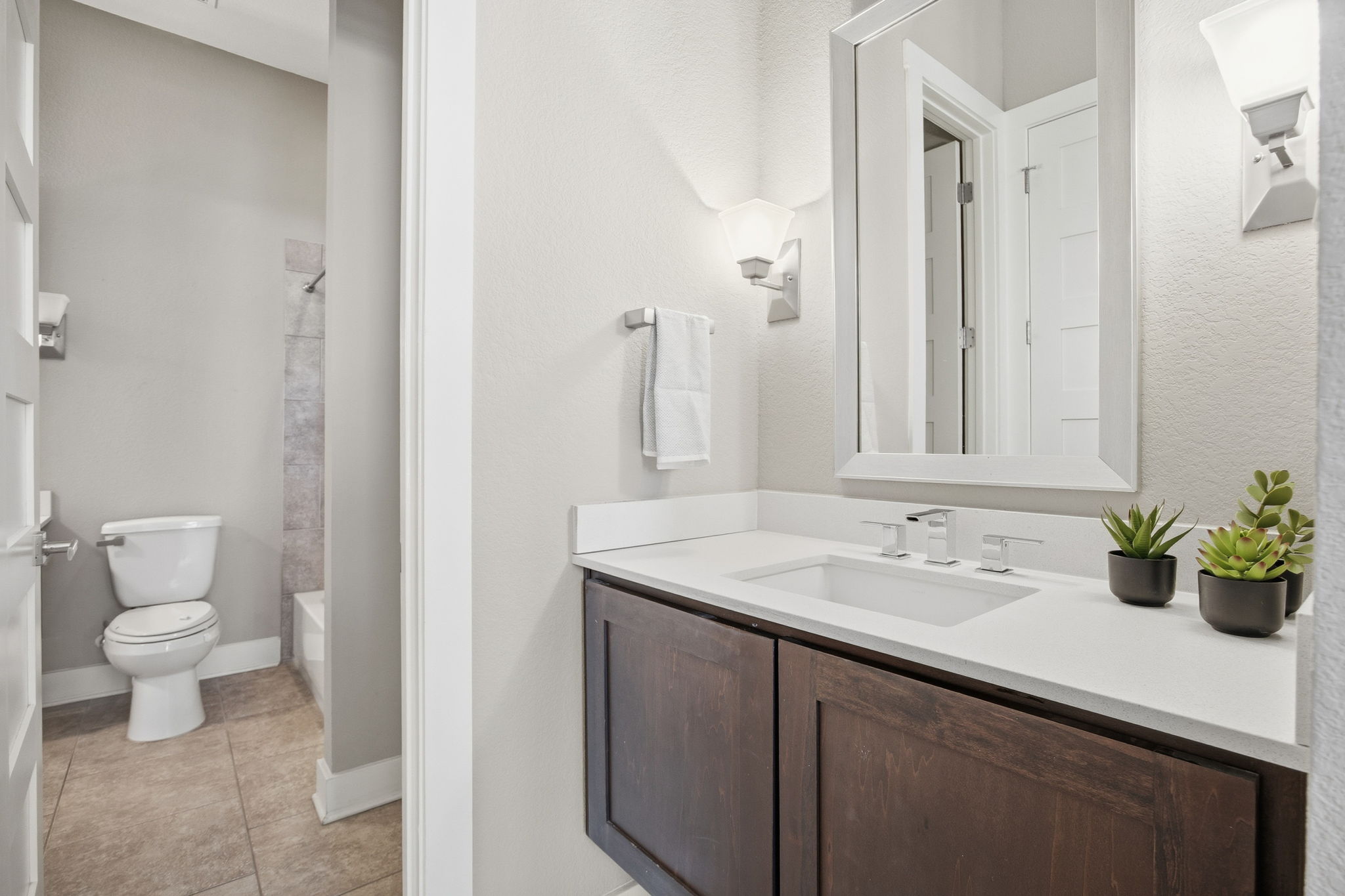 3521 Marcae Court Austin, TX 78704 - Photo 23 of 37 Full bathroom featuring vanity, shower / tub combination, and light tile patterned floors