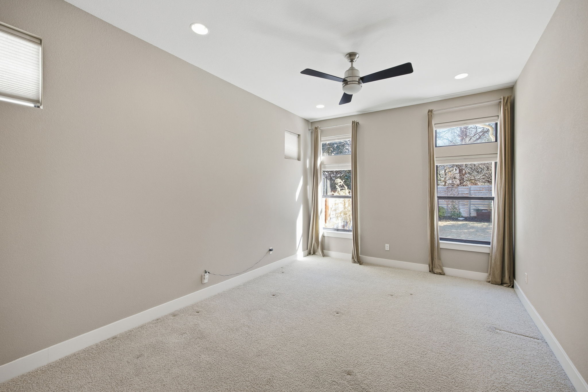 3521 Marcae Court Austin, TX 78704 - Photo 26 of 37 Spare room featuring carpet flooring, recessed lighting, and ceiling fan