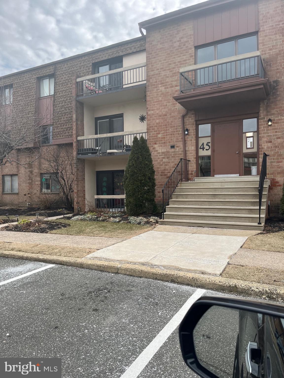 45301 Delaire Landing Road, Unit 301 Philadelphia, PA 19114 - Photo 1 of 9 a view of a house with a patio