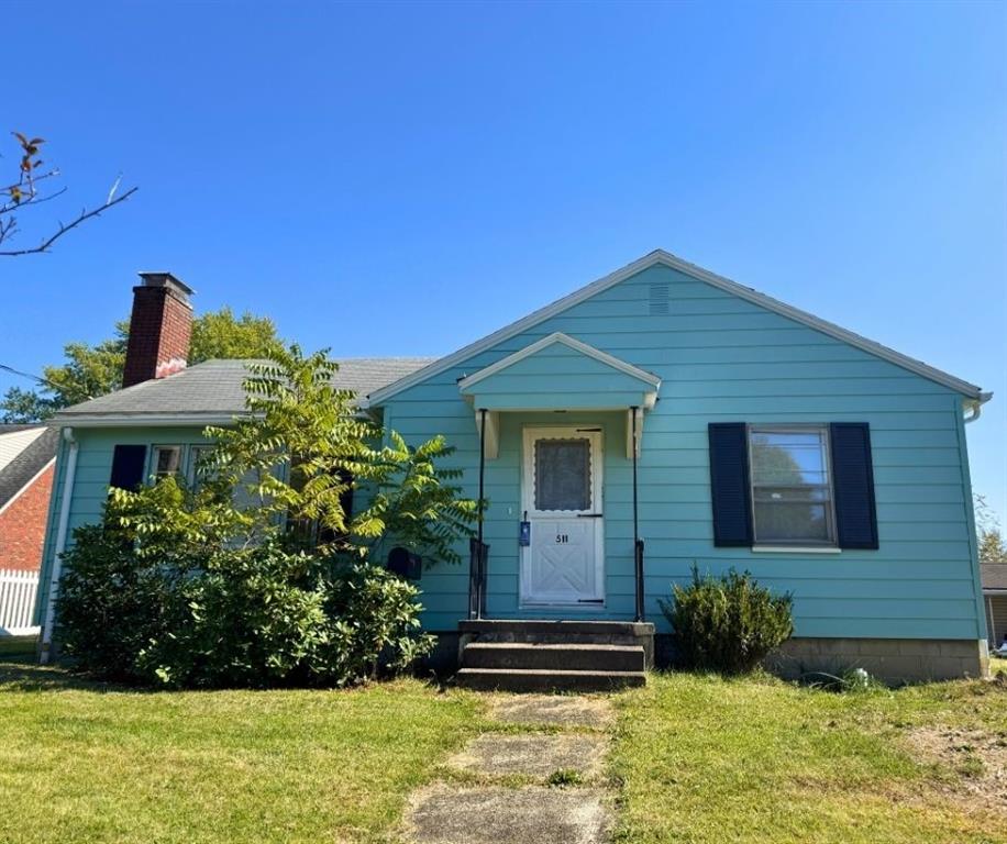 511 Ridgeway Avenue Grove City, PA 16127 - Photo 1 of 18 a front view of a house with garden
