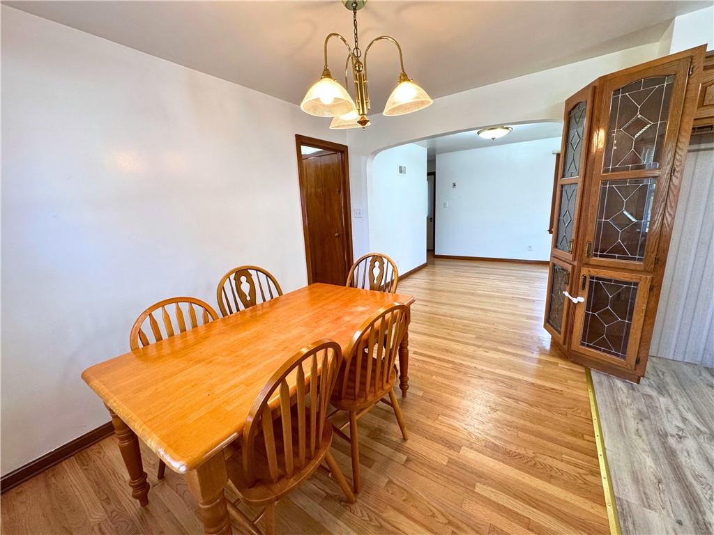 511 Ridgeway Avenue Grove City, PA 16127 - Photo 10 of 18 a dining room with wooden floor table and chairs
