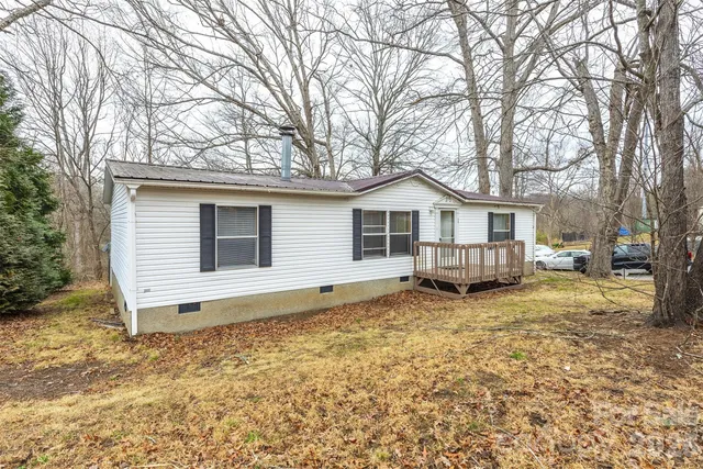 a house with trees in front of it