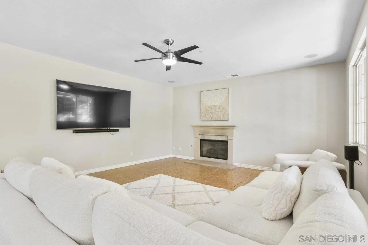 2957 Ranch Gate Road Chula Vista, CA 91914 - Photo 17 of 75 a living room with furniture and a flat screen tv