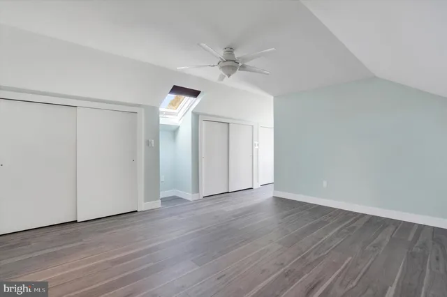 a view of empty room with floor to ceiling window