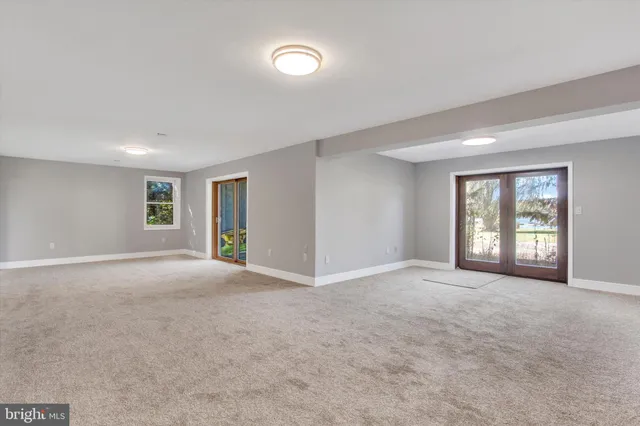 a view of an empty room and window
