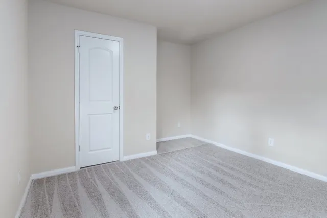 a view of a backyard of the house