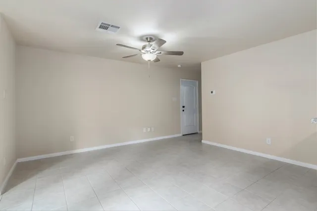 a kitchen with granite countertop stainless steel appliances and wooden cabinets