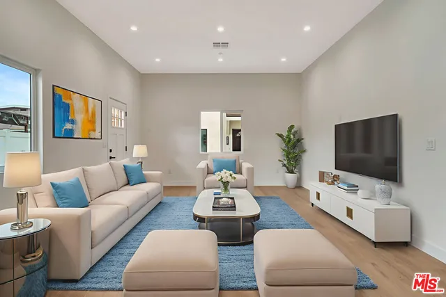 a front view of a house with stairs