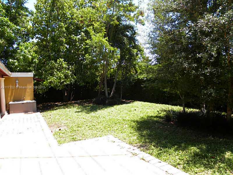 6180 Southwest 11th Street West Miami, FL 33144 - Photo 4 of 20 a view of backyard of the house