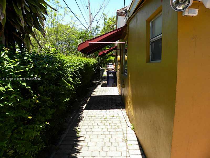 6180 Southwest 11th Street West Miami, FL 33144 - Photo 5 of 20 a view of balcony with wooden floor