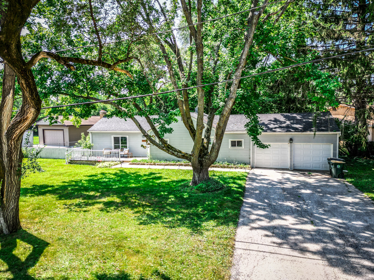 1010 Manhatas Trail Algonquin, IL 60102 - Photo 1 of 1 a front view of a house with garden