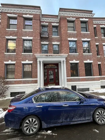 a front view of a building with entryway