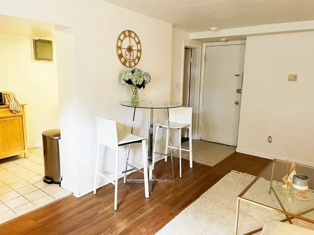 a view of dining room and wooden floor