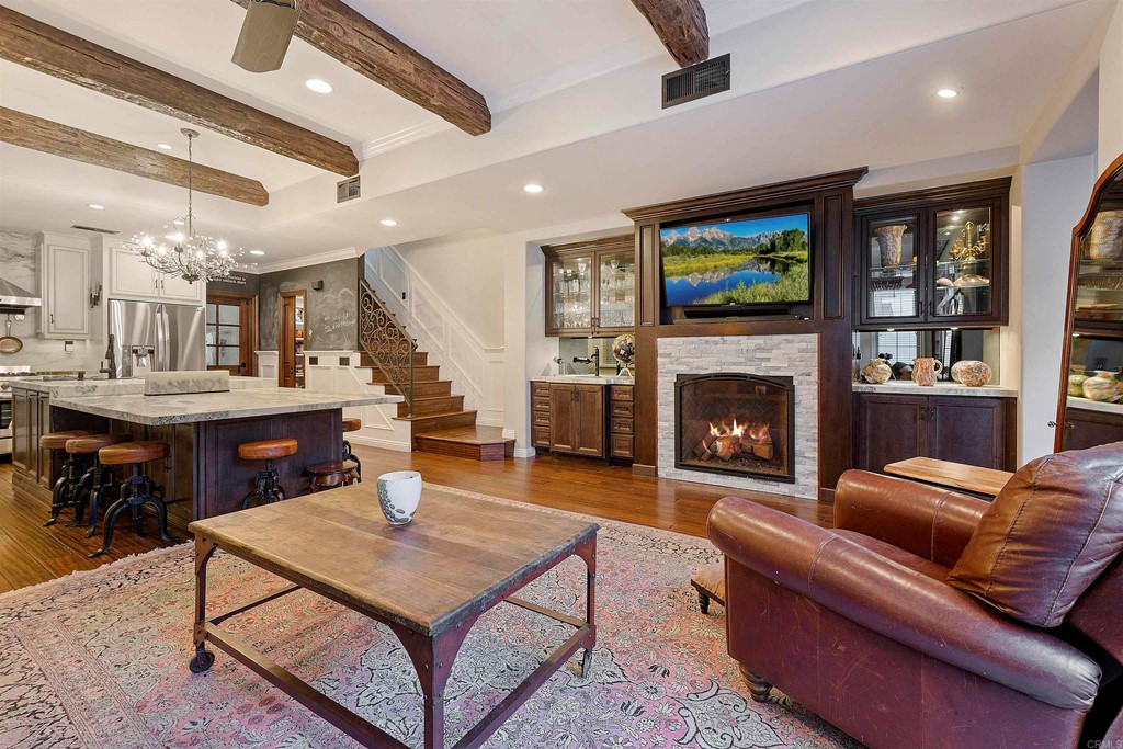 2074 Historic Decatur Road San Diego, CA 92106 - Photo 1 of 1 a living room with furniture a flat screen tv and a fireplace