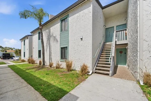 a view of a back yard of the house
