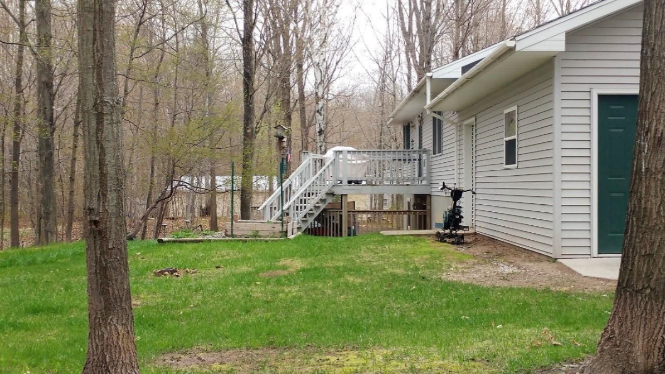 4490 Tamarack Road Ludington, MI 49431 - Photo 37 of 39 Backyard Deck