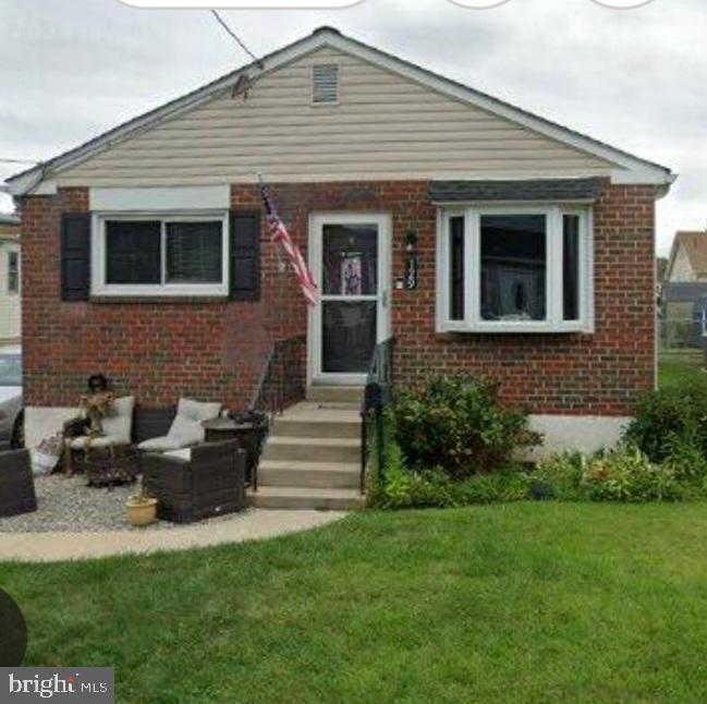 129 Maple Avenue Brookhaven, PA 19015 - Photo 2 of 16 a front view of a house with garden
