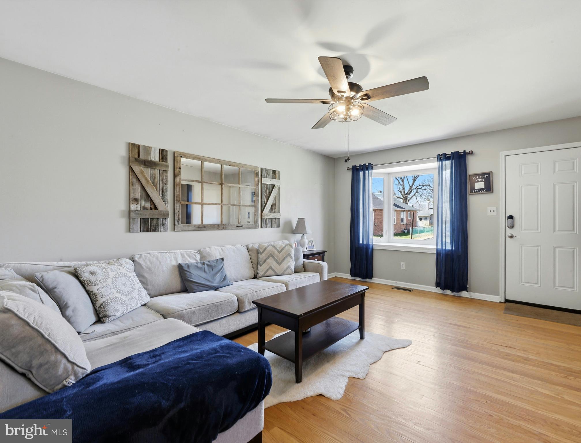 129 Maple Avenue Brookhaven, PA 19015 - Photo 4 of 16 a living room with furniture and a window