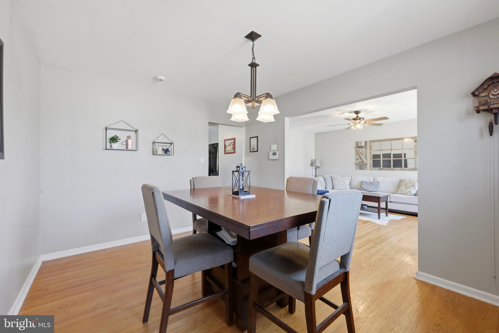129 Maple Avenue Brookhaven, PA 19015 - Photo 7 of 16 a view of a dining room with a table and chairs