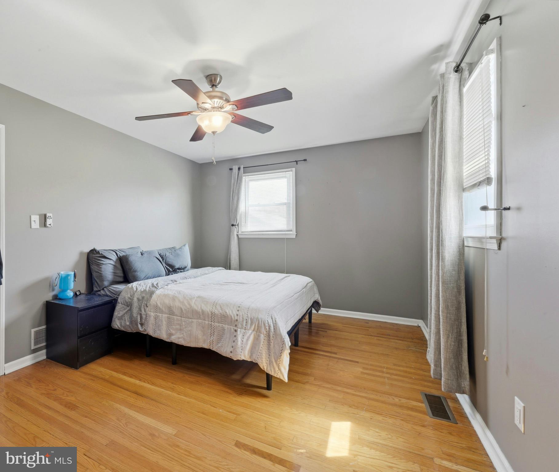 129 Maple Avenue Brookhaven, PA 19015 - Photo 9 of 16 a bedroom with bed and window