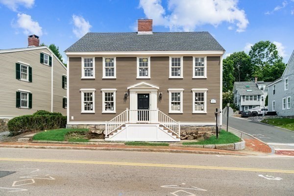 73 North Street, Unit A Hingham, MA 02043 - Photo 1 of 16 front view of a house with a yard