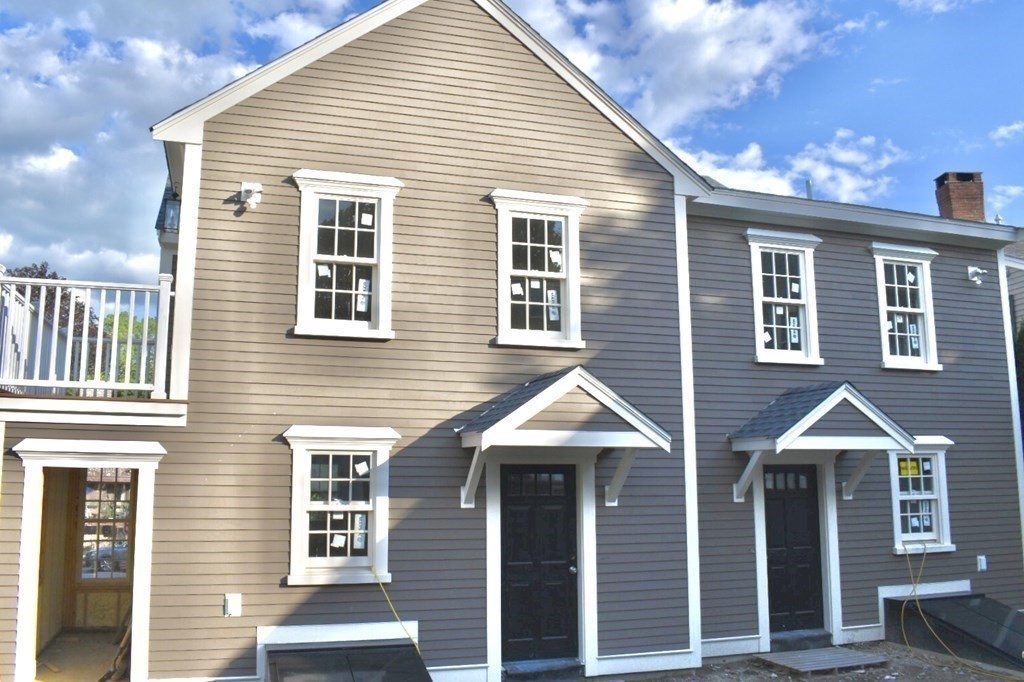 73 North Street, Unit A Hingham, MA 02043 - Photo 4 of 16 a front view of a house with balcony