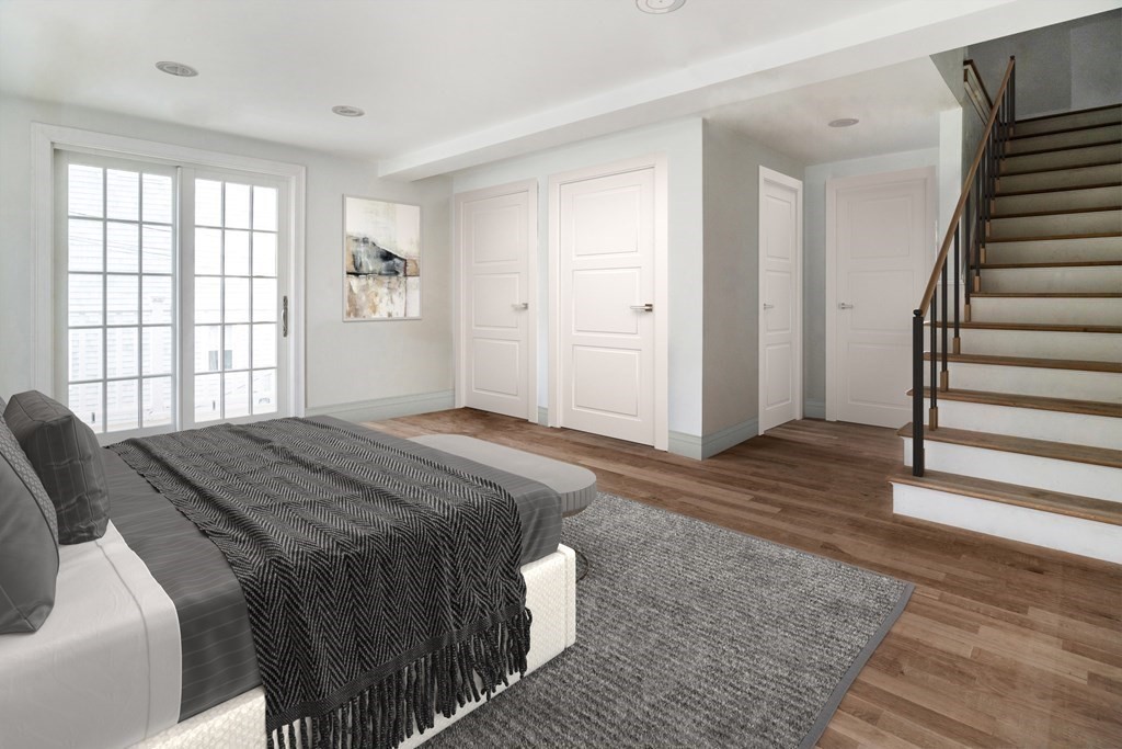 73 North Street, Unit A Hingham, MA 02043 - Photo 7 of 16 a bedroom with a bed and window