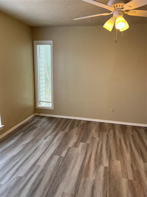 2234 Irwin Street Fort Worth, TX 76110 - Photo 12 of 17 en view of an empty room with a window