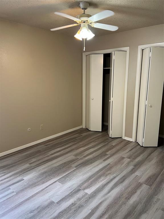 2234 Irwin Street Fort Worth, TX 76110 - Photo 9 of 17 a view of a livingroom with a fan