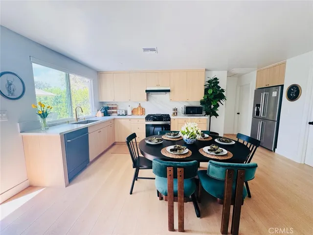 a bedroom with a bed and a desk