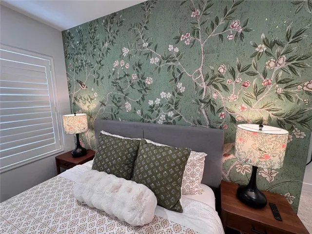 a stove top oven sitting inside of a kitchen