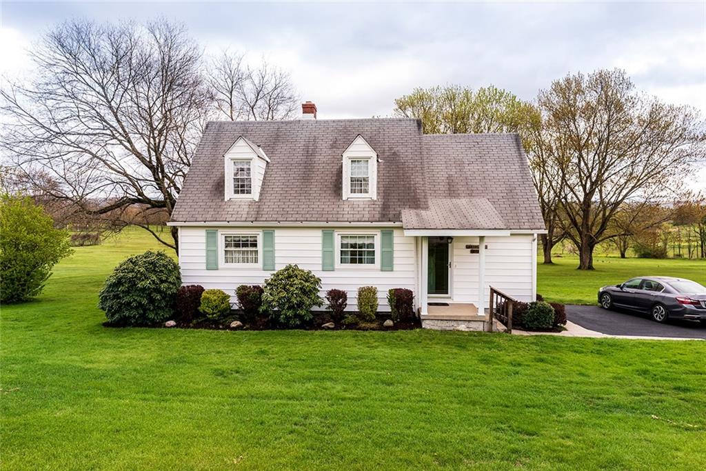 180 Holly Place Road Mount Pleasant, PA 15666 - Photo 2 of 23 ADORABLE CAPE COD ON 2.2 LEVEL ACRES ADJACENT TO FAIRWAY #10 OF THE NORVELT GOLF COURSE!