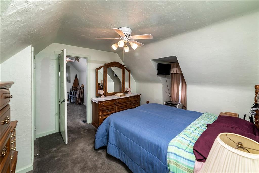 180 Holly Place Road Mount Pleasant, PA 15666 - Photo 16 of 23 BEDROOM #2 WITH ACCESS TO 12X6 DEN/OFFICE OR STORAGE.