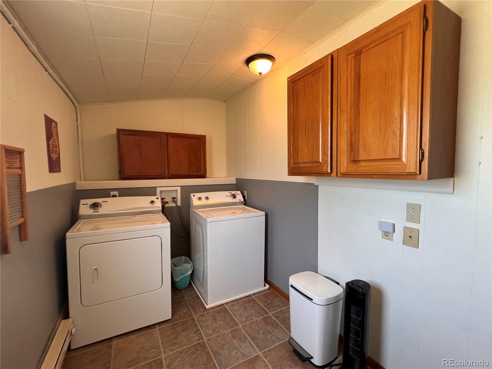 204 Main Street Genoa, CO 80818 - Photo 13 of 25 a utility room with dryer and washer