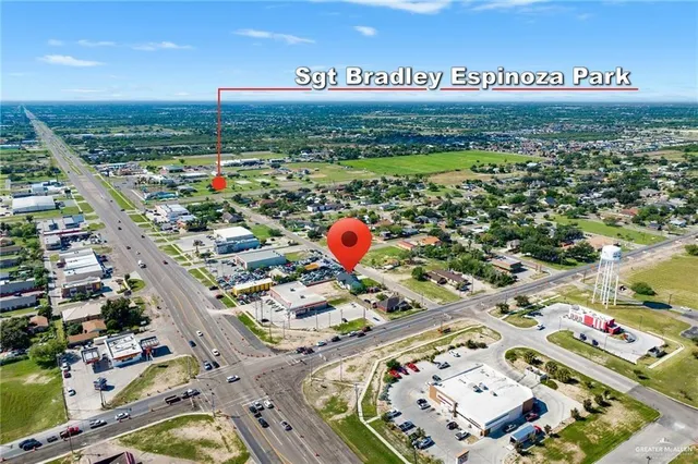 a view of a park with an ocean view