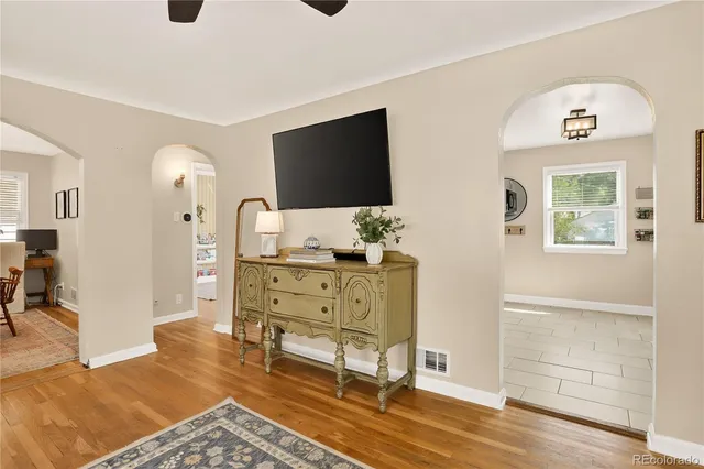 a room with furniture and flat screen tv