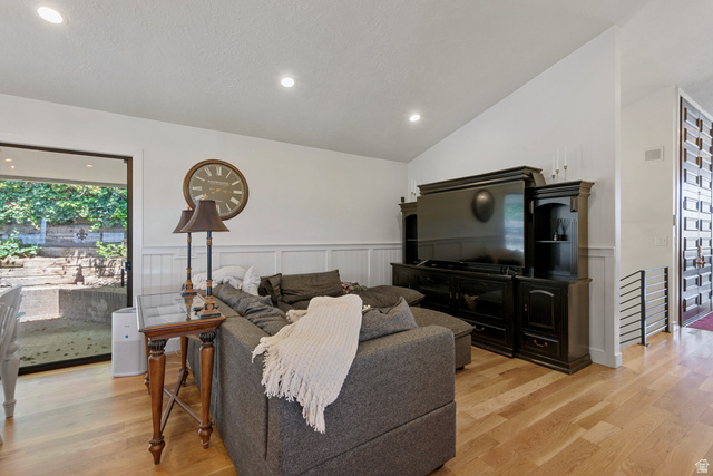 1900 North 100 East Provo, UT 84604 - Photo 10 of 49 Living area featuring wood-finish flooring, recessed lighting, and wainscoting